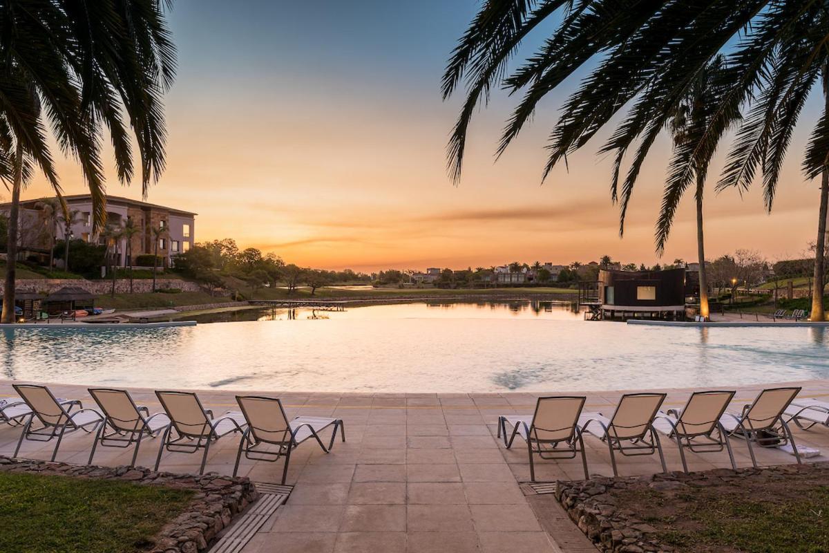 Sofitel La Reserva Cardales Río Luján Екстериор снимка Sunset at the Ritz-Carlton, Naples